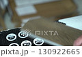 Close-up of an electric jigsaw cutting quartz vinyl. Professional quartz vinyl laying, the workflow of installing floor coverings. High quality 4k footage 130922665