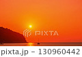 Time lapse Waves kiss the sandy beach while the fading sunlight creates a warm, romantic glow over the horizon. Serene Paradise Sunset by the Sea at Kala island Layan beach Phuket 130960442