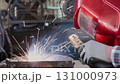 Side View Construction Industrial Factory or Metalwork Concept by Mechanic or Technician Welder Welding Structure Parts 131000973