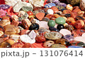 Colorful tumbled gemstones creating a vibrant and diverse gemstone collection 131076414