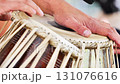 Musician playing tabla drums during a concert in India 131076616