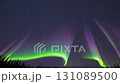 A beautiful loop video of a fantastic aurora spreading across the night sky 131089500