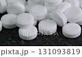 Sugar substitute pills rotating in close up. Artificial sweetener tablets zero calories 131093819