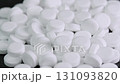 Sugar substitute pills rotating in macro. Artificial sweetener tablets zero calories 131093820
