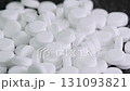 White round pills and drugs rotating close up. Modern science and technology. Pharmaceutical production 131093821