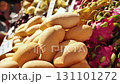 Ripe mangoes and dragon fruit for sale at an outdoor market in India 131101272