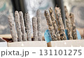 Incense sticks from India displayed in cardboard boxes are ready to be burned 131101275