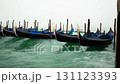 Gondolas, the typical and romantic form of transportation in Venice, one of the most typical and beautiful European cities 131123393
