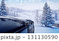 Winter train peaceful and tranquil journey that takes you through a stunning snowy landscape filled with majestic pine trees, creating a serene and picturesque atmosphere all around you 131130590