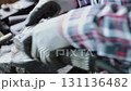 Track Shot Zoom Back View Construction Industrial Factory or Metalwork Concept by Mechanic or Technician Using Grinder with Auto Part Workshop 131136482