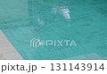 Swimming pool top view. Blue water pool in hotel. 131143914