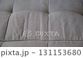 Expert cleaner hands using vacuum cleaner removing dirt stains from sofa. 131153680