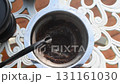 Coffee Brewing Process with Ground Coffee Using Metal Filter and Pour Over Technique 131161030