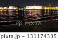 Night landscape of Saint Petersburg. Slowly swaying waves of the Neva river 131174335