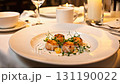Rotating shot of food and tableware on a table in a luxury restaurant 131190022