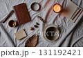 Still Life with Cozy Autumnal Arrangement on White Linen Bed Sheet 131192421