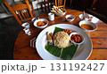 Traditional Sri Lankan Meal Served in Rustic Dining Room 131192427