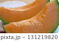 Scooping Yubari melon with a spoon 131219820
