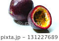 Rotation of a half and a whole ripe passion fruits. 131227689