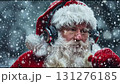 A video of Santa Claus listening to the music in the snow. Santa singing a song in big headphones. 131276185