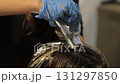 Step-by-step DIY hair highlighting process at home, showing techniques to achieve beautiful, sun-kissed streaks without a salon visit 131297850