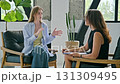 Young woman in psychology session talking with professional therapist, mental specialist 131309495