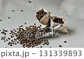 Scattering coffee beans 131339893