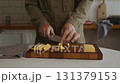 Mindful preparation of cheese pieces 131379153