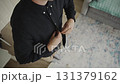 Top view of man adjusting shirt for confident appearance 131379162