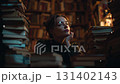 Beautiful brunette woman is in vintage library, reading old books. She has dreamy and wondering mood 131402143