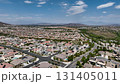 Aerial view of a sprawling neighborhood of family homes in Menifee, California, USA. 131405011