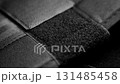 Nylon velcro fastener strip in black color. Macro shot. Rotation 131485458