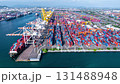 Aerial top view hyperlapse container cargo ship international port terminal with gantry crane, industrial cargo container port loading and unloading, Global business logistic import export. 131488948