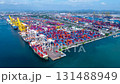 Aerial top view hyperlapse container cargo ship international port terminal with gantry crane, industrial cargo container port loading and unloading, Global business logistic import export. 131488949