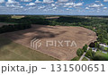 Aerial view of farmland surrounded by forest in the Belgian province of Walloon Brabant. 131500651