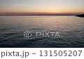 Breathtaking aerial drone view of Adriatic sea and Lanterna peninsula in Istria, Croatia during golden hour sunset, showing endless sea, horizon, coastline, turquoise waters. 131505207