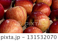 Fresh apples displayed at a local market enticing shoppers in autumn season 131532070