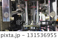 Industrial machinery operating with precision in a manufacturing plant 131536955