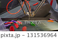 Robotic Arm Sorting Vegetables on Conveyor Belt 131536964