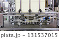 Industrial robotic arm handling metal sheet in factory 131537015