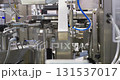 Industrial machinery operating with precision in a manufacturing plant 131537017
