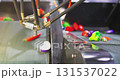 Robotic Arm Sorting Vegetables on Conveyor Belt 131537022