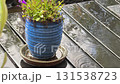 Rainy weather scene with droplets on table  131538723