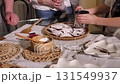 Family Serving Christmas Holiday Dessert 131549937