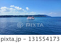 鹿児島湾を進む桜島フェリー船 131554173