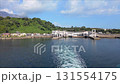 桜島港を出港し鹿児島港へ向かうフェリーからの眺め 131554175
