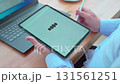 Grok logo on a smartphone screen with AI integrated circuits glowing in the background, highlighting cutting-edge technology and artificial intelligence.  131561251