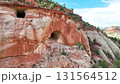 Aerial Sandstone Cliffs and Caves Fly Over Motion in Utah Desert 131564512