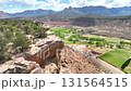 Aerial Red Rock Cliff Valley and Mountain Range Fly Through Forward 131564515