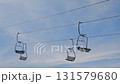 Empty chairlifts at the summit of Mount Babadag against cloudy sky, Turkey 131579680